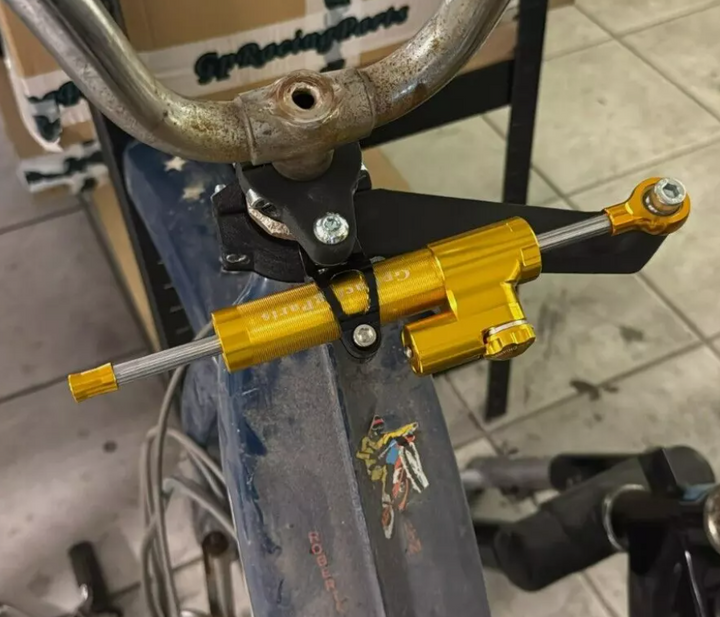 Ammortizzatore di sterzo argento Piaggio Ciao 50 tutti i modelli (Tranne Ciao Mix, Ciao 30th anniversary)